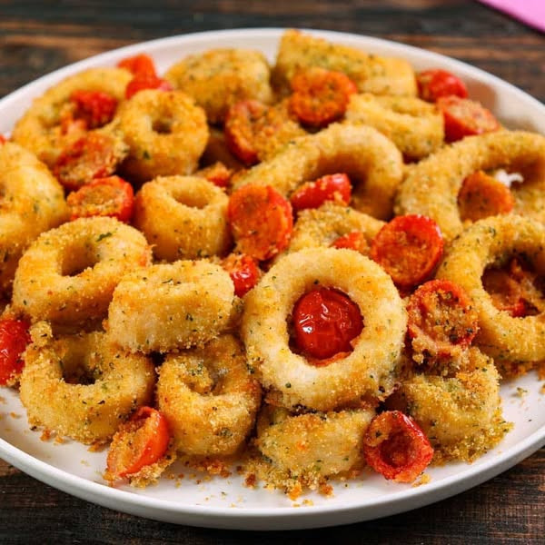 Fette di calamaro gratinato